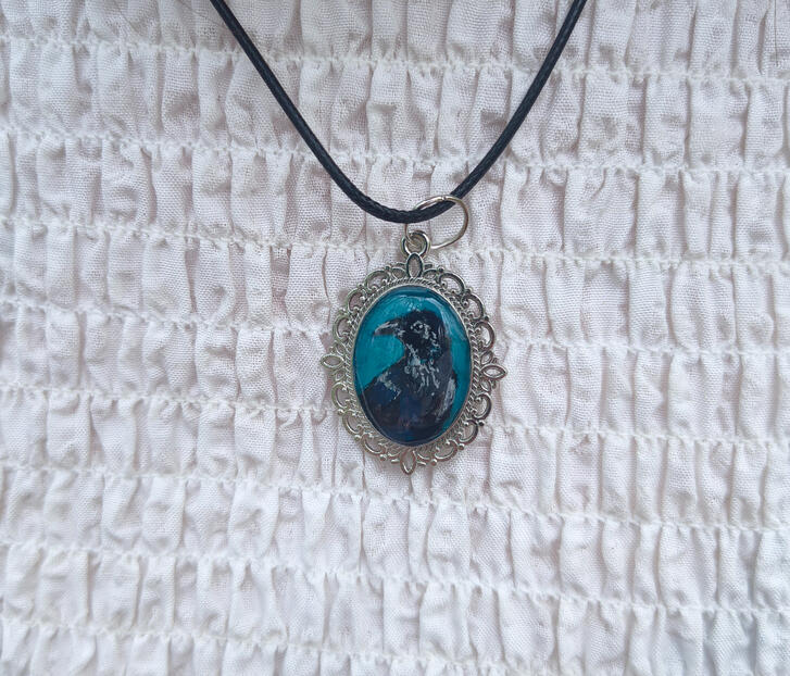 Hand-painted pendant by Fauna Witch